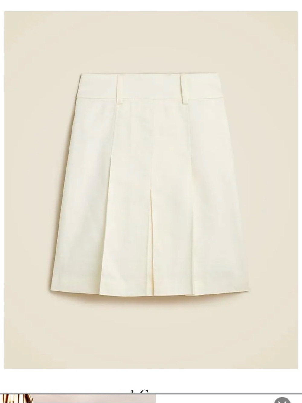 NWT J CREW knee length pleated skirt.  Ivory. Size 4.  Retails for $109